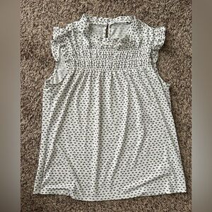 White Sleeveless Blouse